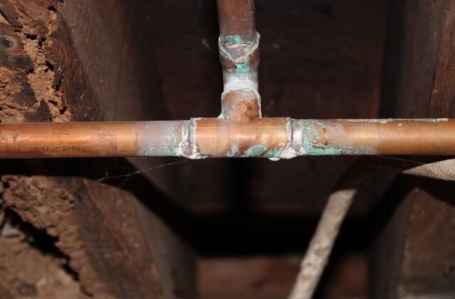 Corrosion inside a copper pipe caused by acidic well water