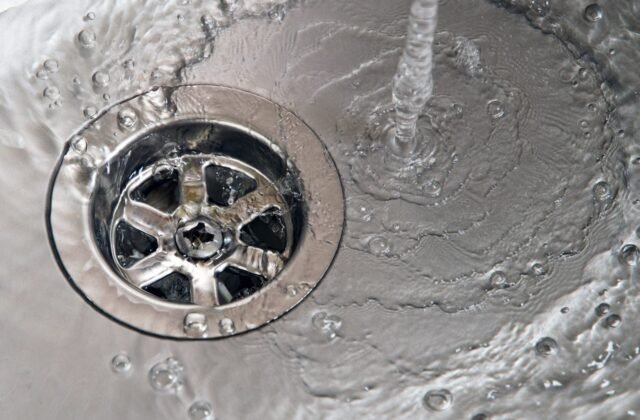 Water draining from a kitchen sink