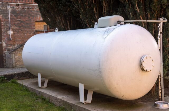 An outdoor propane tank supplying a home